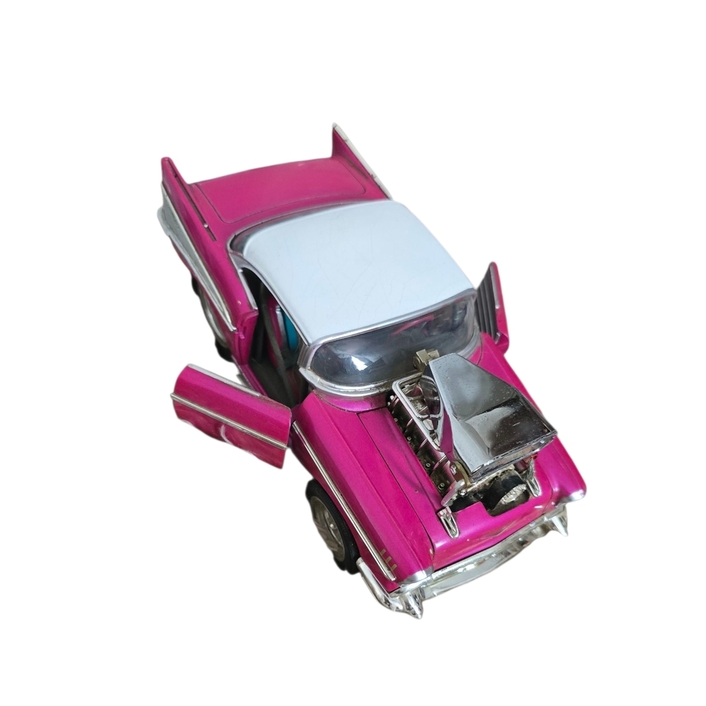 Muscle Machines 1:24 Scale 57 Chevy Magenta With White Top